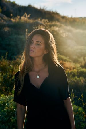Cheerful woman looking away