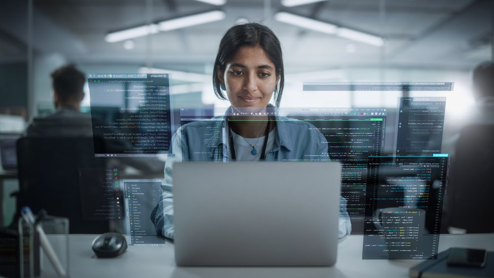 Young Indian Female Software Developer Working in Technological Start-Up Office.