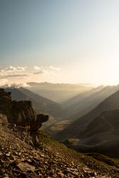 Mysterious mountain high in row in sunlight