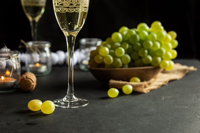 Glasses with wine and grapes