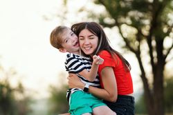 Affectionate mom with son outdoor