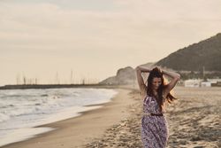 Woman with dress at the beach