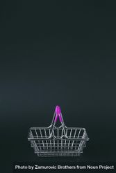 Shopping basket on dark background 5X3lV0
