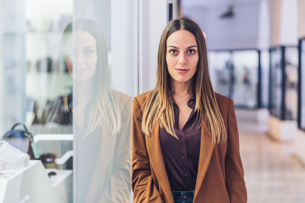 Fashionable female in trendy wear at mall