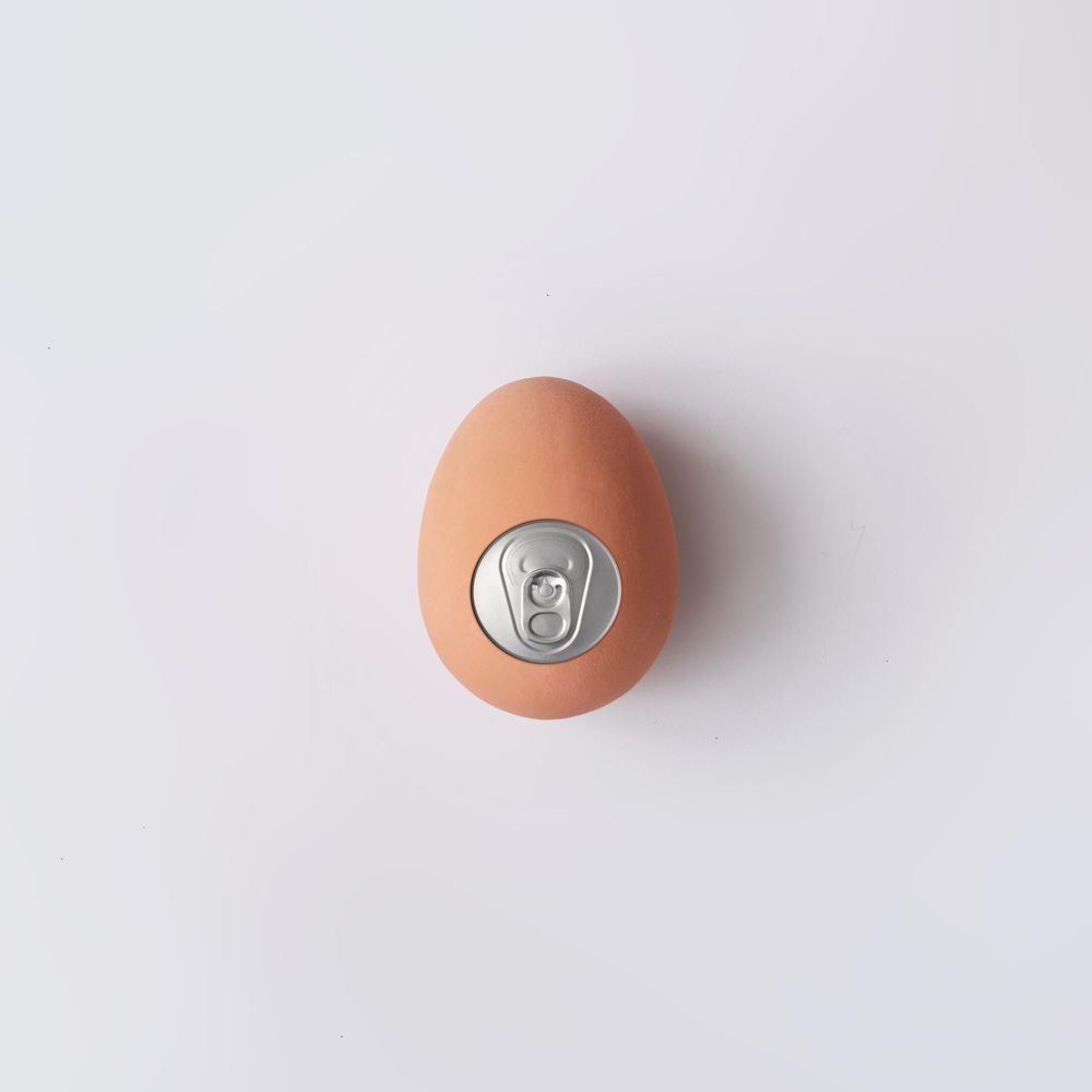 Egg with soda can lid