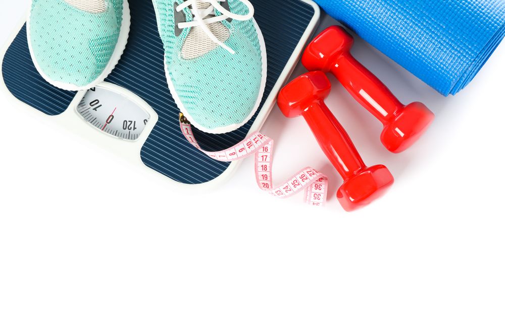 Healthy lifestyle accessories isolated on plain background