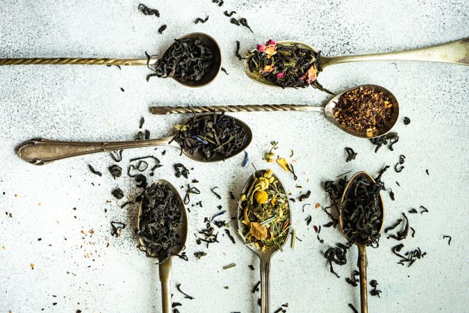 Varieties of tea in vintage spoons