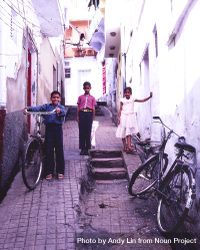 Udaipur, Rajasthan, India - Aug 2003 - Children and bicycles in alley 4AlqE5