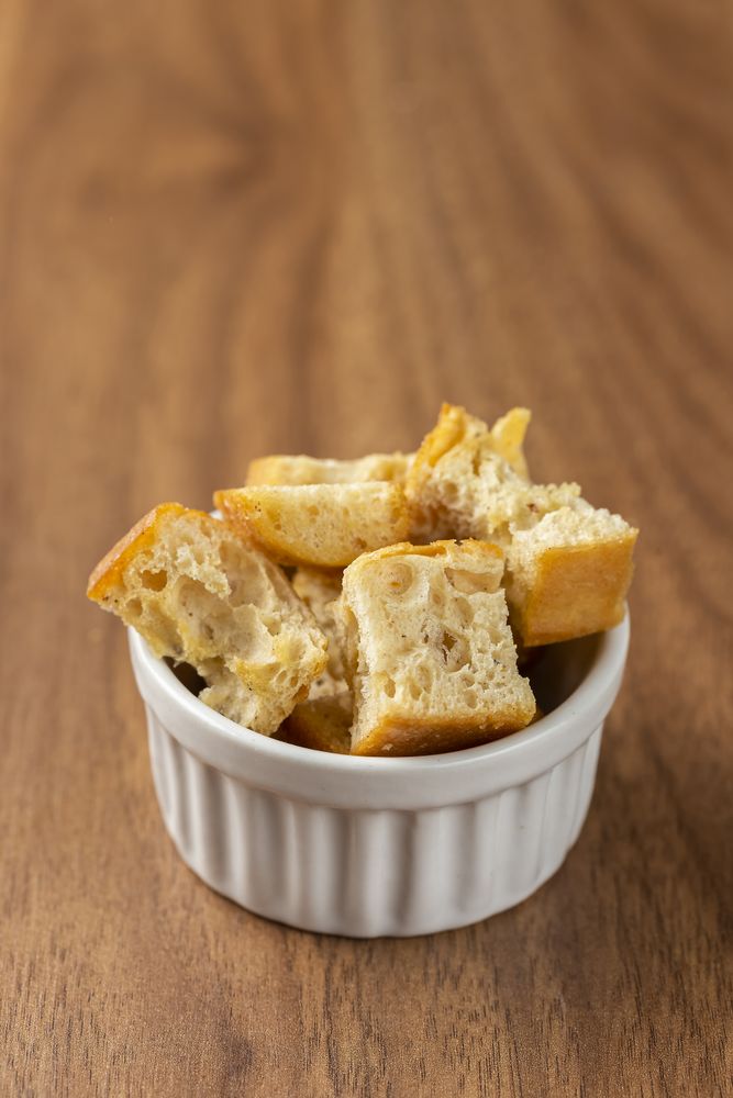 Delicious crunchy croutons on the table.