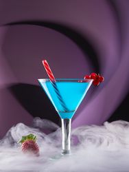 Glass with drink and berries