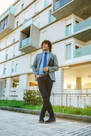 Businessman posing in the street