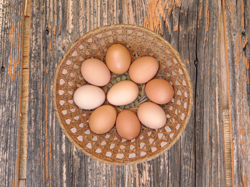 Eggs On The Wooden Background