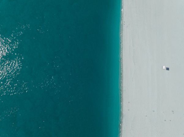 Aerial abstract photo of a calm blue water