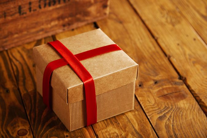 Cardboard presents with a red ribbon