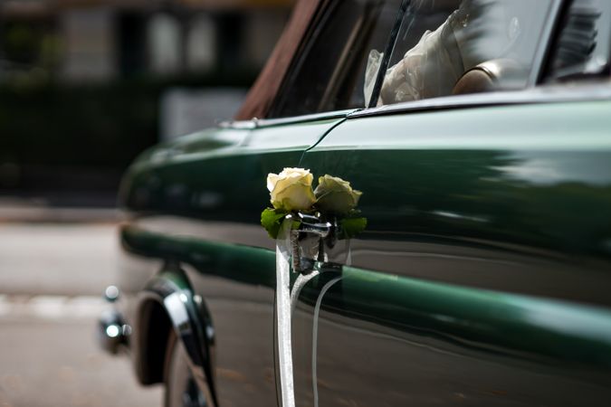Delicate details of the wedding celebration. Newlyweds hold hands.