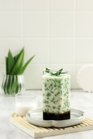 Cendol is an Iced Sweet Dessert, Contains Drop of Green Rice Flour Jelly, Coconut Milk and Palm Sugar Syrup.