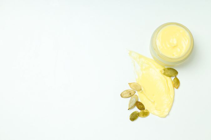 Skin care and face care concept - pumpkin cosmetic