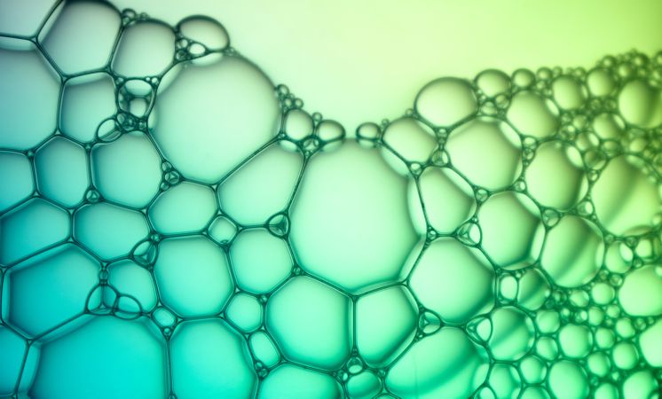 Abstract background bio technology, macro photography foam and water with gradient background. Molecule multicolor backgorund