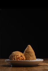 Two Sicilian Arancini One Cut Open