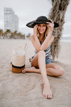 Young female relaxing on beach