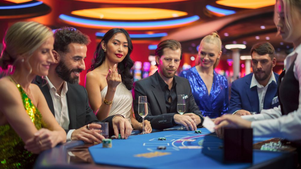 Portrait of a Glamorous Asian Woman at a Blackjack Gambling Table in a Modern Casino.