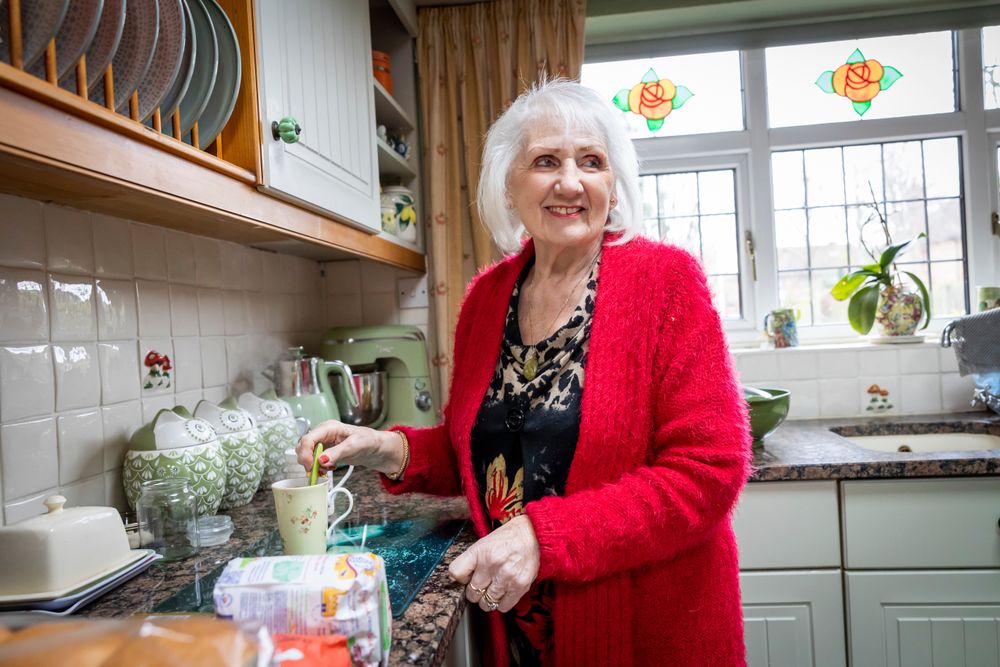 Woman at kitchen counter