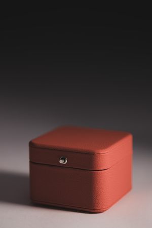 Red jewelry gift box on background