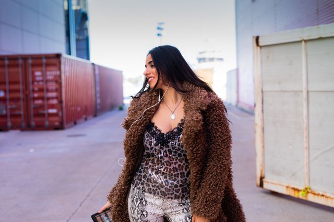Excited female on city street