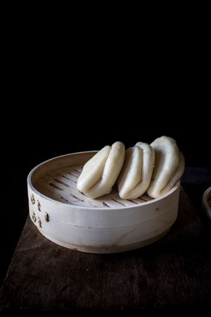 Buns in bamboo steamer