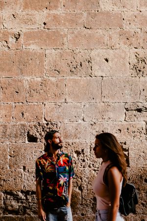 Couple in old town exploring architecture