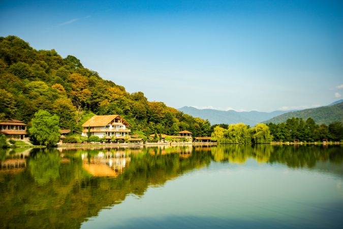 Still Lopota lake with reflection of mountains