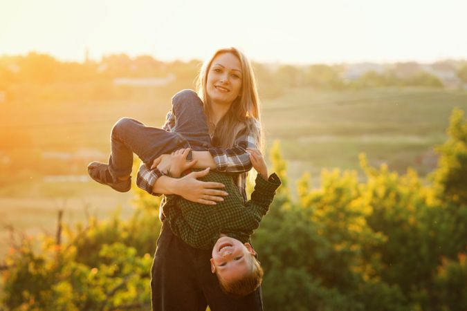 Happy mother and child at dusk together