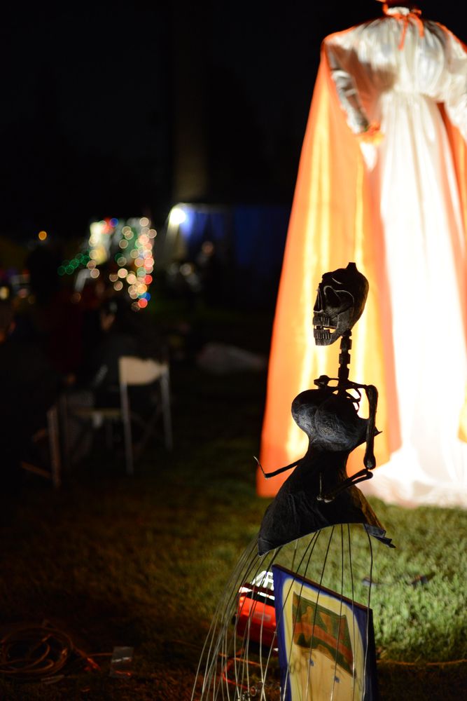 Skeleton representing a woman at altar at Day of the Dead event