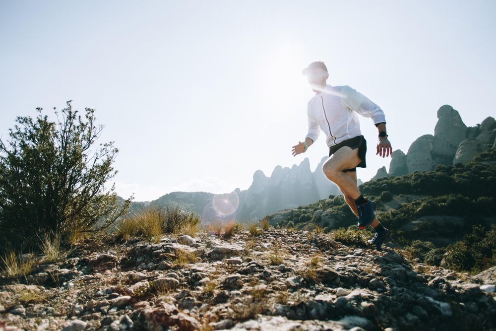 Athlete training on rugged terrain