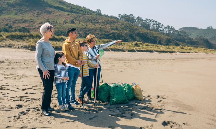 Volunteers posing after cleaning the beach