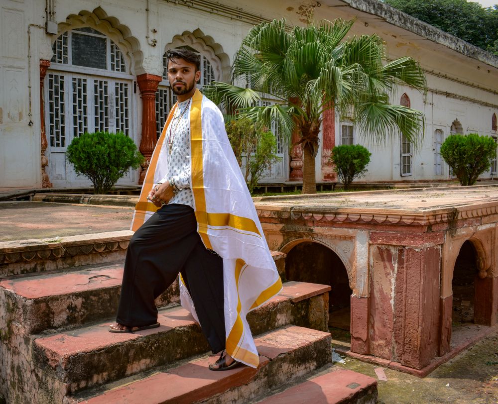 Man standing on concrete stairs outdoor