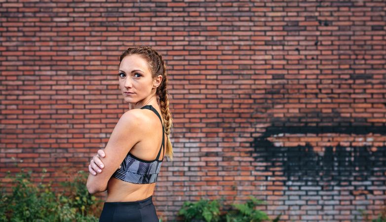 Sportswoman with boxer braids posing