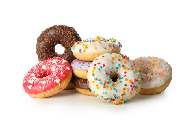 Tasty baked donuts isolated on plain background