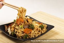 Yakisoba noodles. Yakisoba dish with meat, chicken and vegetables. beXOXA