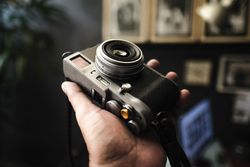 Retro camera being held in someone’s hand