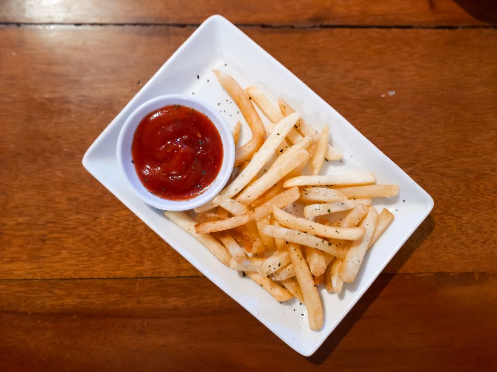 French Fries with Ketchup on Plate - Top View