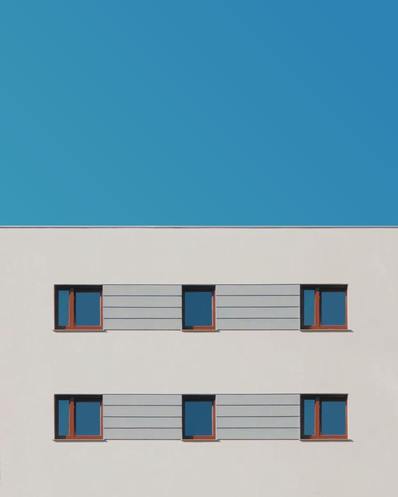 Concrete building with three symmetrical windows