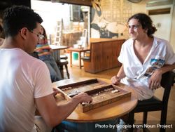 Two men playing backgammon at a cafe in Beirut bGGpBb