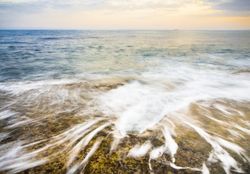 Sun rising over beautiful sea