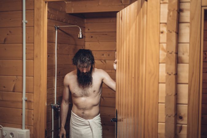 Man getting out of the shower