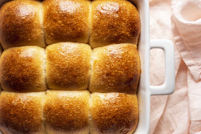 Bread buns home-baked in a ceramic tray