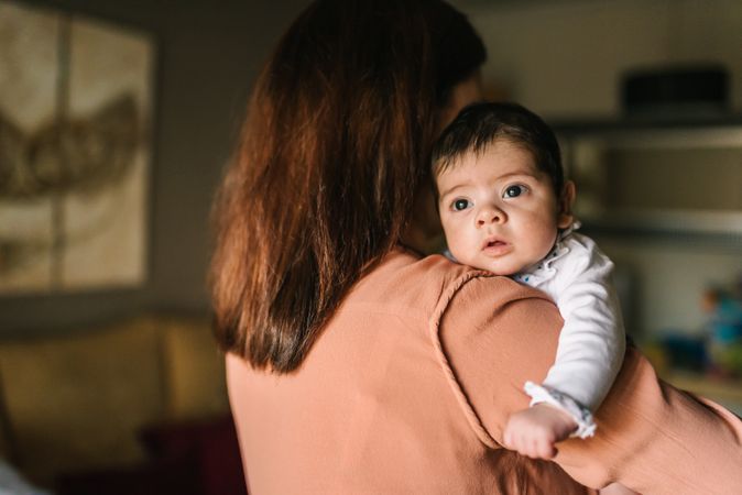 Mother holding baby in arms