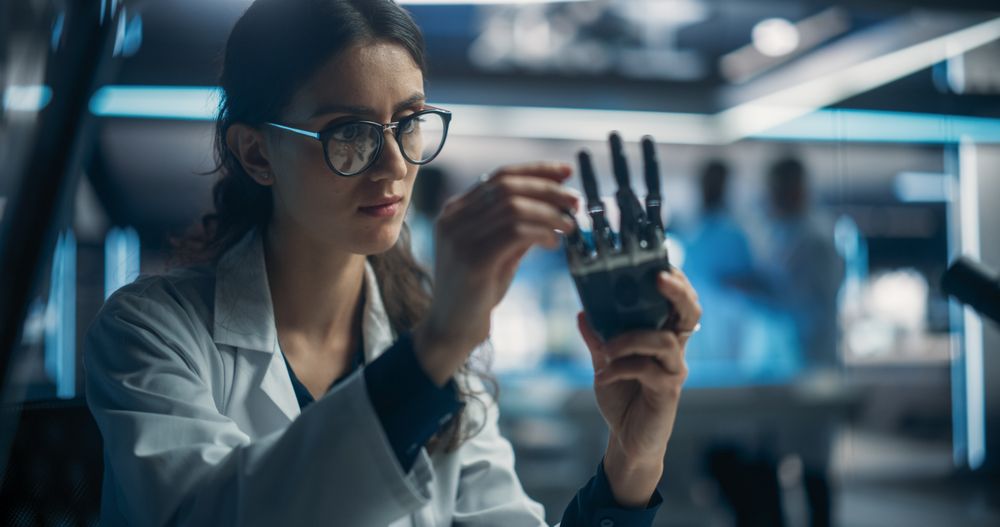 Young Scientist Working on a Bionic Robot Hand for People with Health Conditions or Impairments.