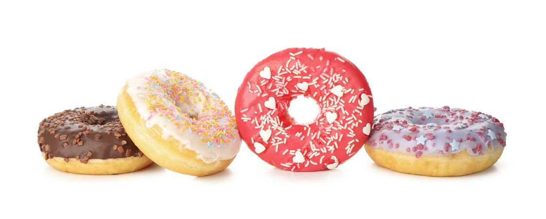 Tasty baked donuts isolated on plain background