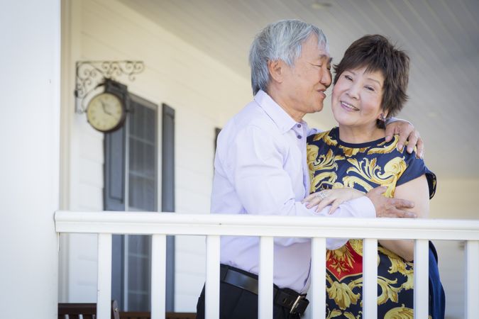 Chinese Couple Enjoying Their House